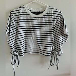 Cropped black and white striped tee with side tie detailing